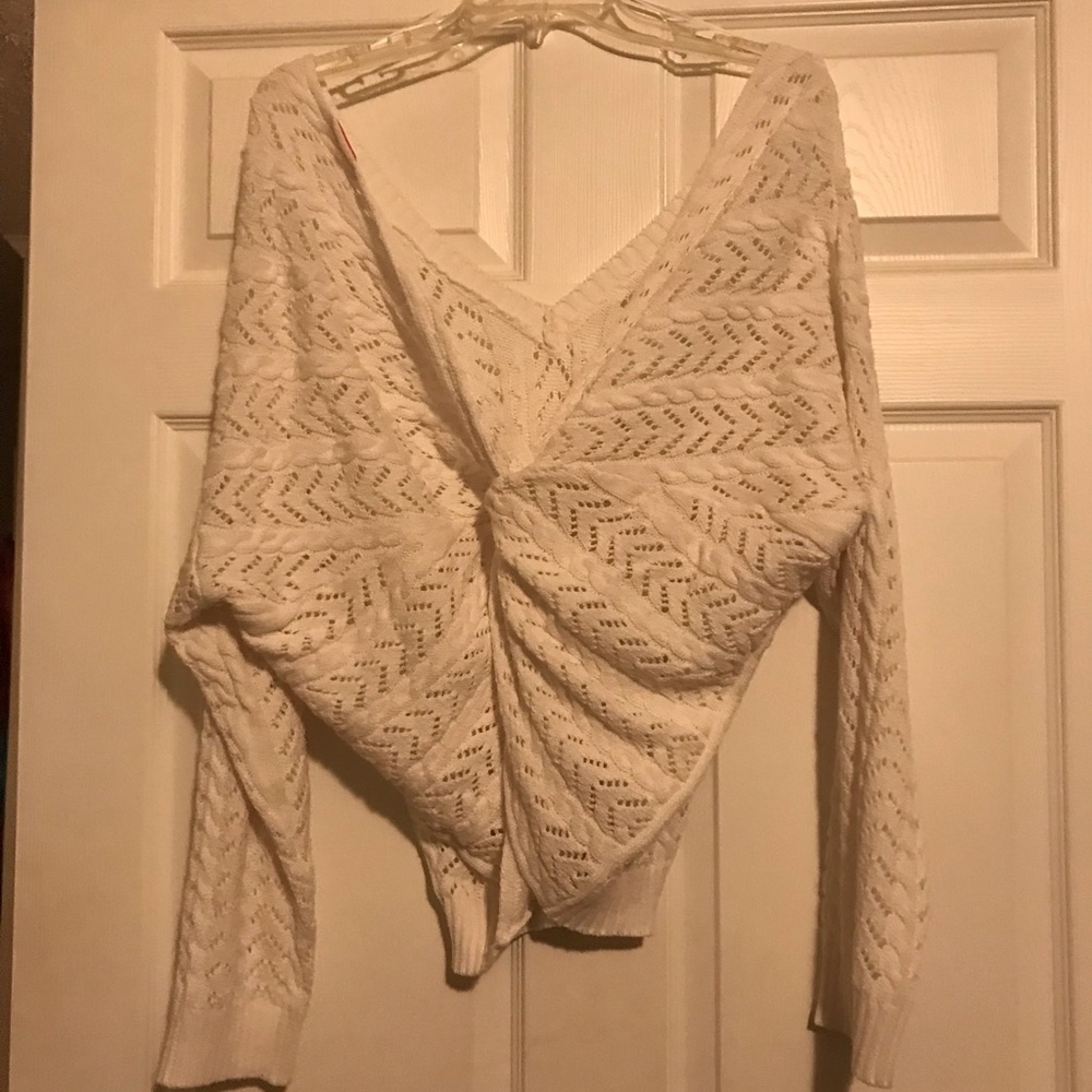 Off shoulder/ crosses in back